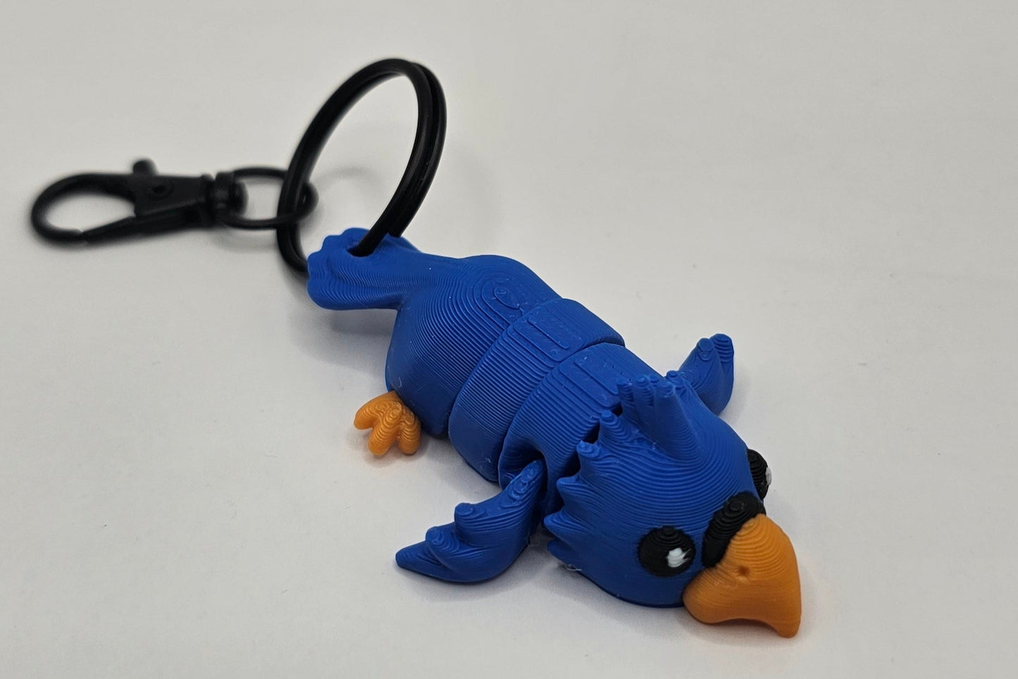 🦜 Porte-Clés Perroquet Bleu – Tropical et Coloré 🌴